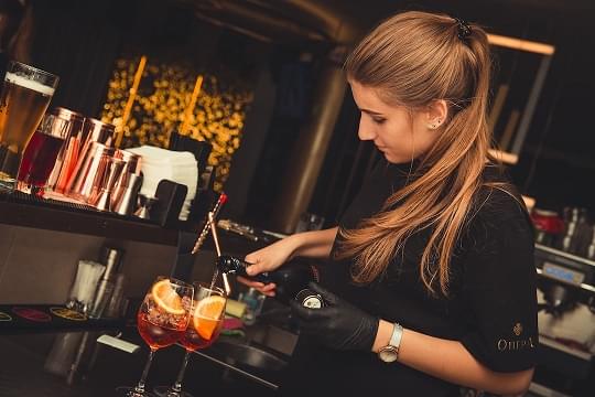 Alcohol Server preparing a cocktail